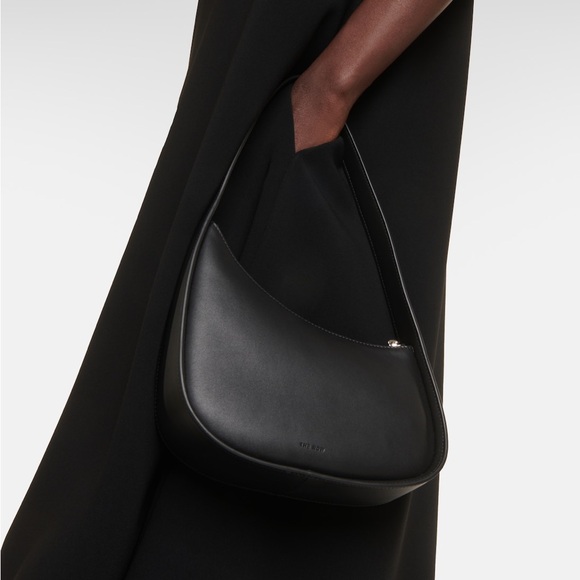 The Row Handbags - THE ROW
Half Moon leather shoulder bag